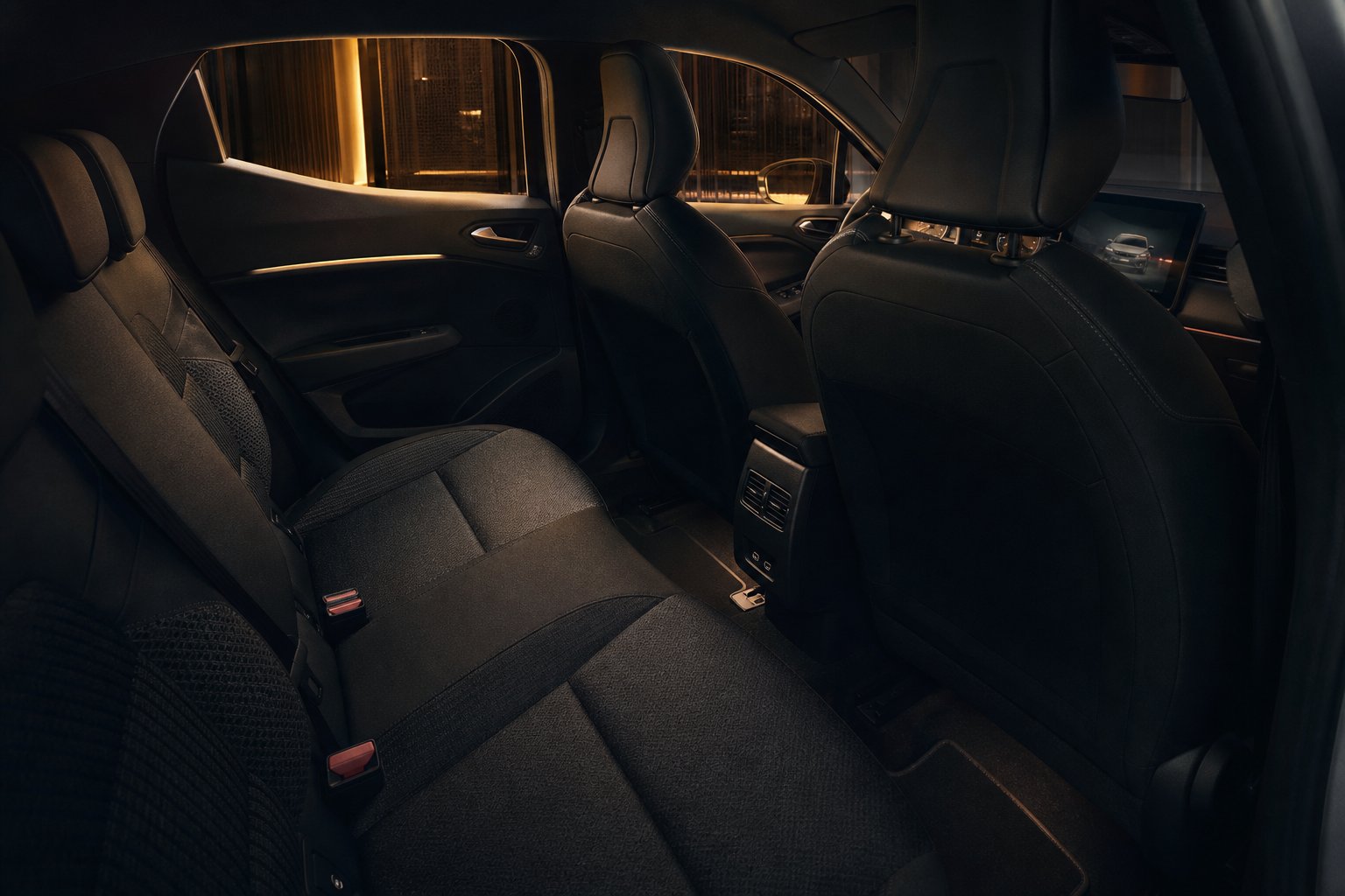 Interieur spacieux de Renault Clio 5 avec sieges confortables et console centrale
